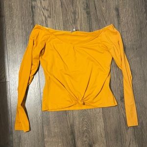 Large, dark yellow long sleeve blouse